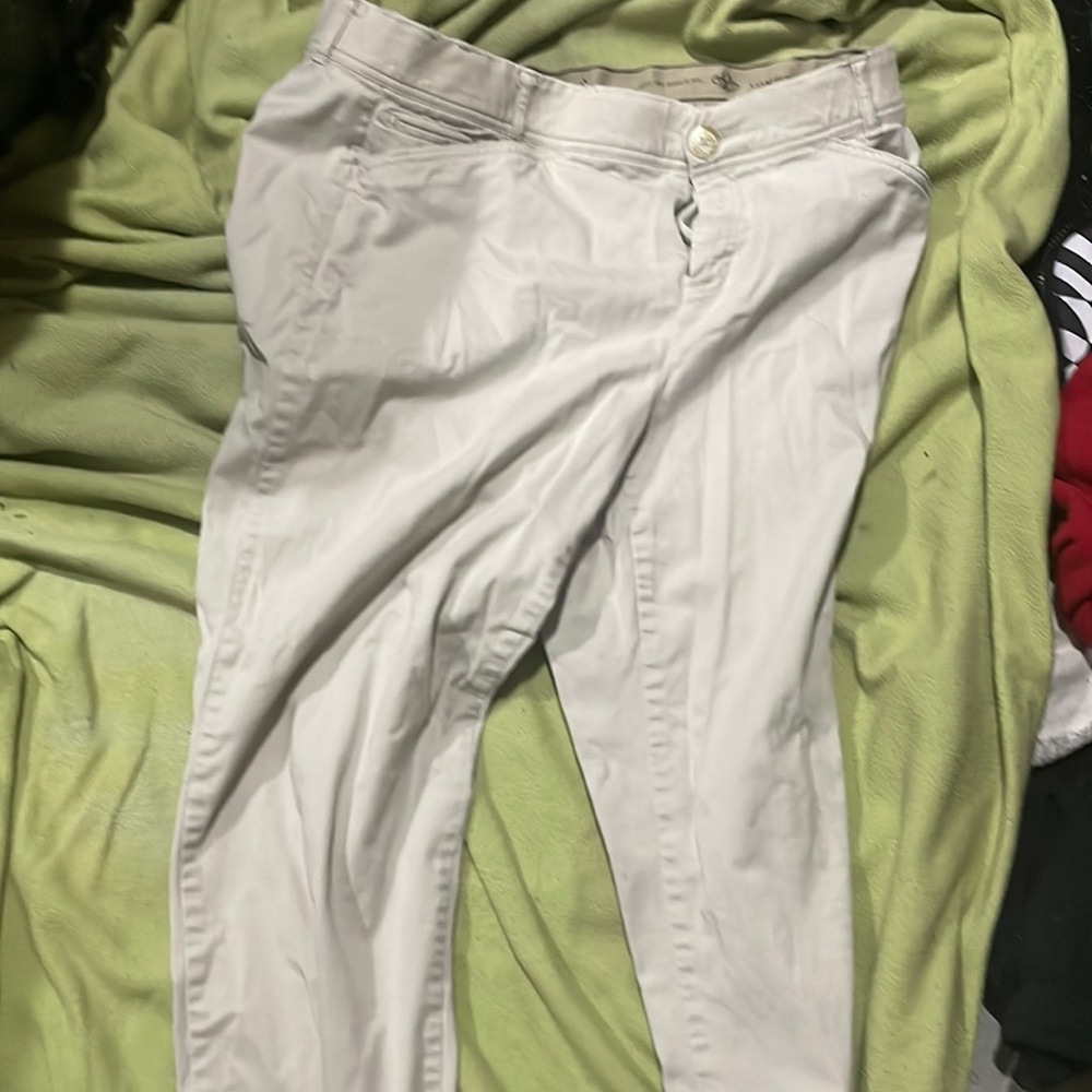 White pair of unused jeans has a comfort waist band there a size 14w